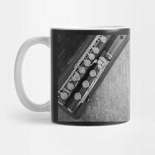 Top down view of wooden flute in a case Mug